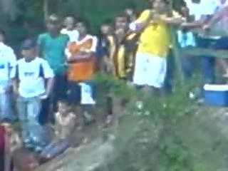 Edan latins having reged clip in the river while rest of the village looking vid