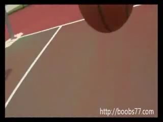 Beautiful chica Juggs out on basketball court