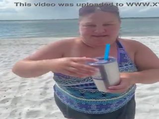Slutty Bbw duca wife flashes her big tits on a public beach